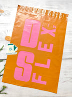 logo and brand name printed burnt orange courier polybag with POD, featuring bold pink branding. Durable poly mailer ideal for secure shipping and brand visibility.
