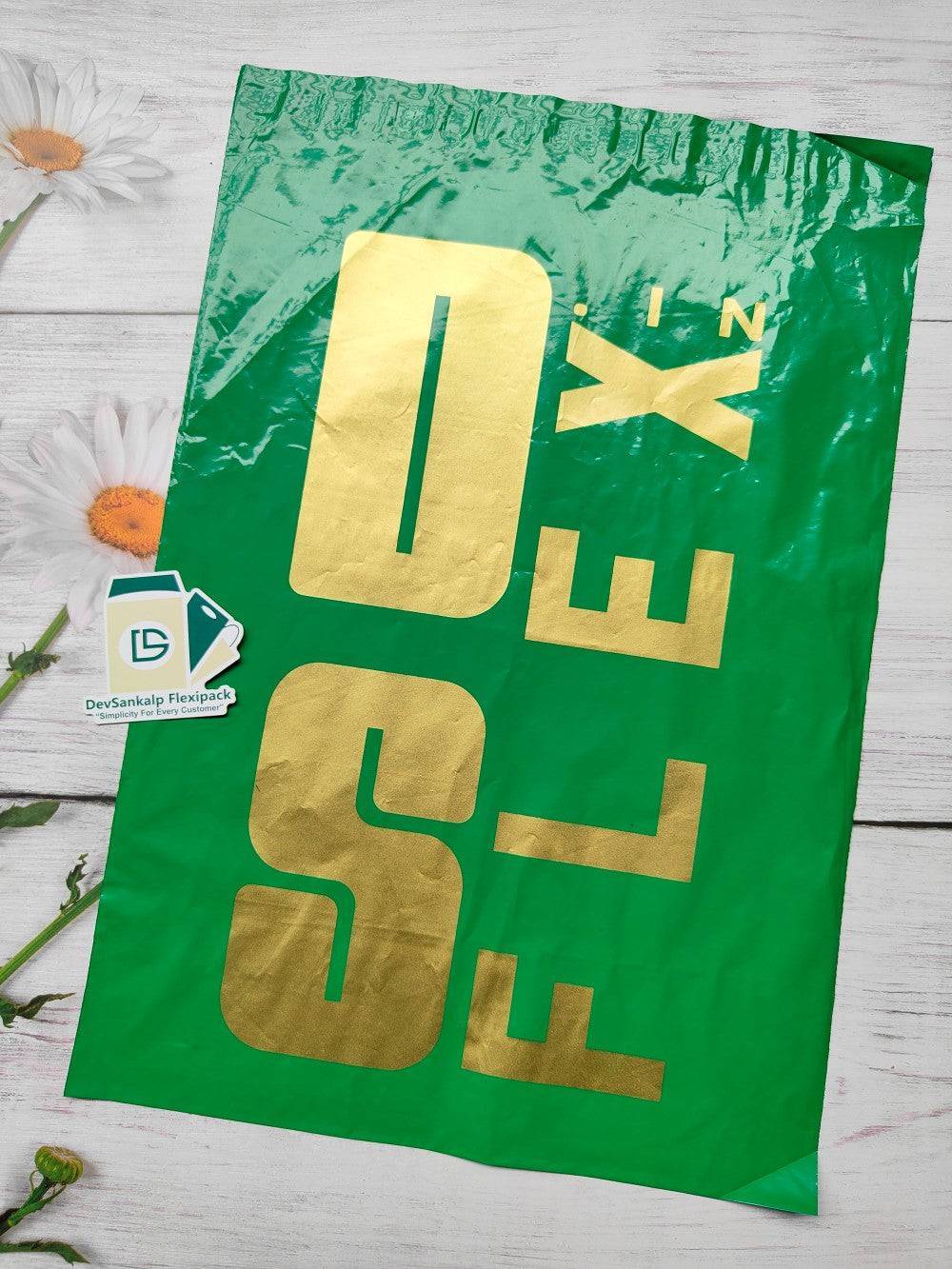 Custom Printed Green Courier Bag with POD featuring bold gold branding. Ideal for secure, branded shipping in office and e-commerce use.