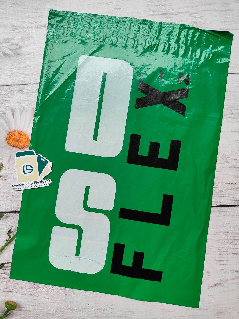 Custom printed green courier bag with POD featuring bold branding. Ideal for secure shipping and custom brand visibility.