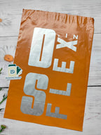 Custom branded orange courier bag with POD, featuring a bold silver logo. Durable poly mailer for secure shipping and brand visibility.