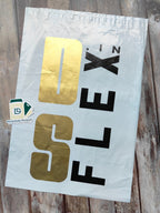 Custom printed courier bag with POD featuring a bold gold and black design for branding. Durable poly mailer ideal for secure shipping and brand visibility.
